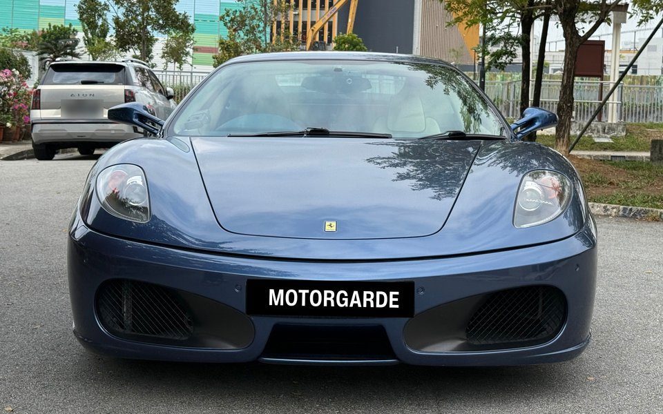 Blue Ferrari F430, front view